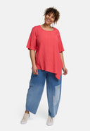 Túnaic 'Crissa' – plissiert, éadrom & nua-aimseartha-asiméadrach