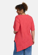 Túnaic 'Crissa' – plissiert, éadrom & nua-aimseartha-asiméadrach